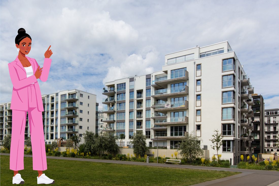 Laura standing in front of new apartment buildings