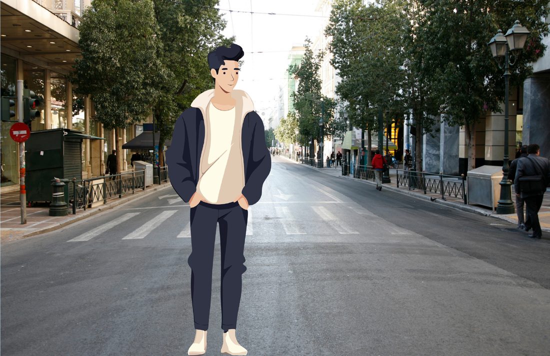 Dan standing alone on a city street